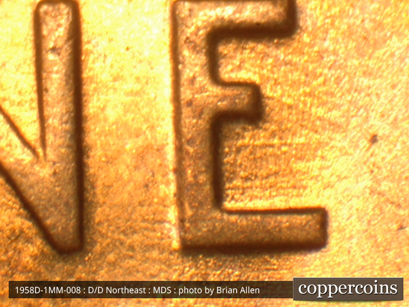 Die-stage B marker on 1958D•1MM•008 (1958 Repunched Mint Mark).
