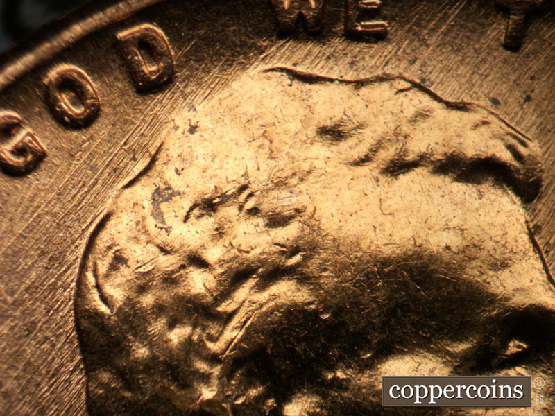Die-stage B marker on 1958D•1MM•009 (1958 Repunched Mint Mark).