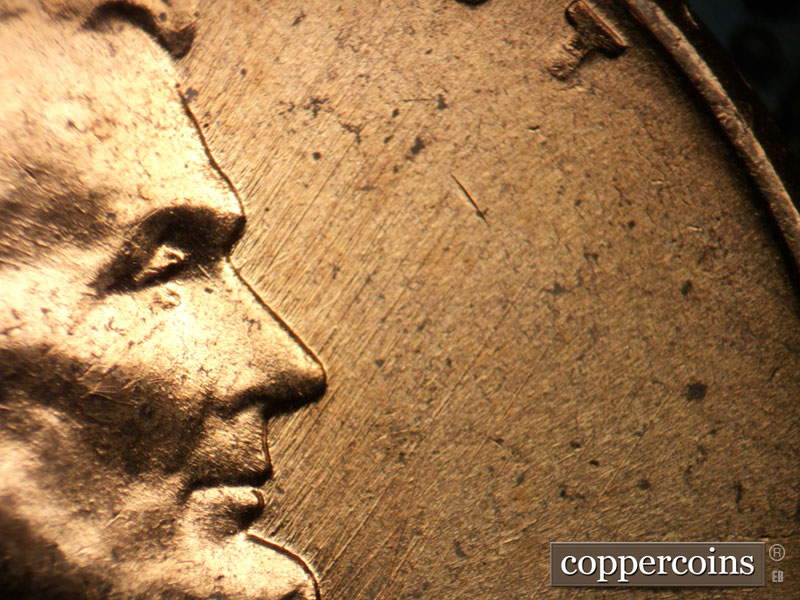 Die-stage B marker on 1958D•1MM•009 (1958 Repunched Mint Mark).