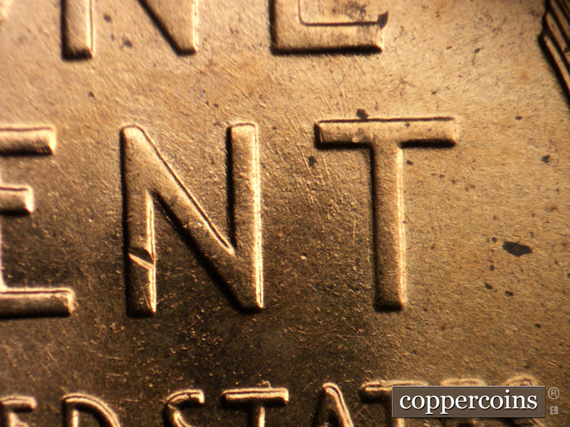 Die-stage B marker on 1958D•1MM•009 (1958 Repunched Mint Mark).