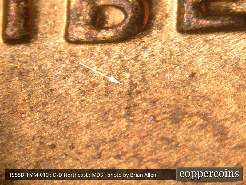 Die-stage B marker on 1958D•1MM•010 (1958 Repunched Mint Mark).
