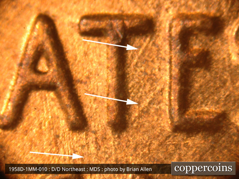 Die-stage B marker on 1958D•1MM•010 (1958 Repunched Mint Mark).
