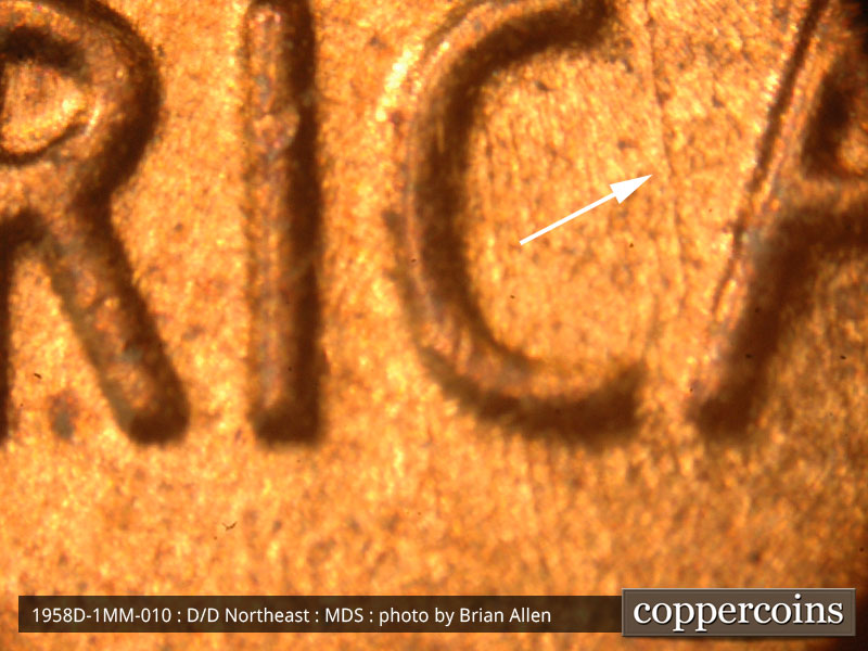 Die-stage B marker on 1958D•1MM•010 (1958 Repunched Mint Mark).