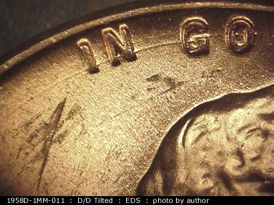 Die-stage A marker on 1958D•1MM•011 (1958 Repunched Mint Mark).