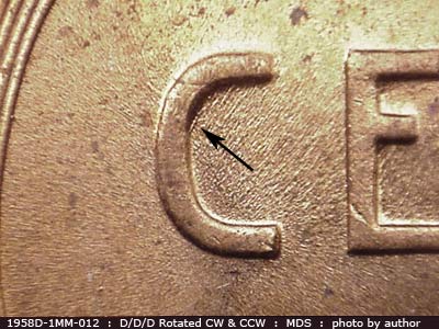 Die-stage B marker on 1958D•1MM•012 (1958 Repunched Mint Mark).