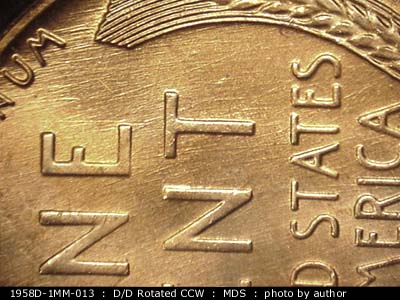 Die-stage B marker on 1958D•1MM•013 (1958 Repunched Mint Mark).