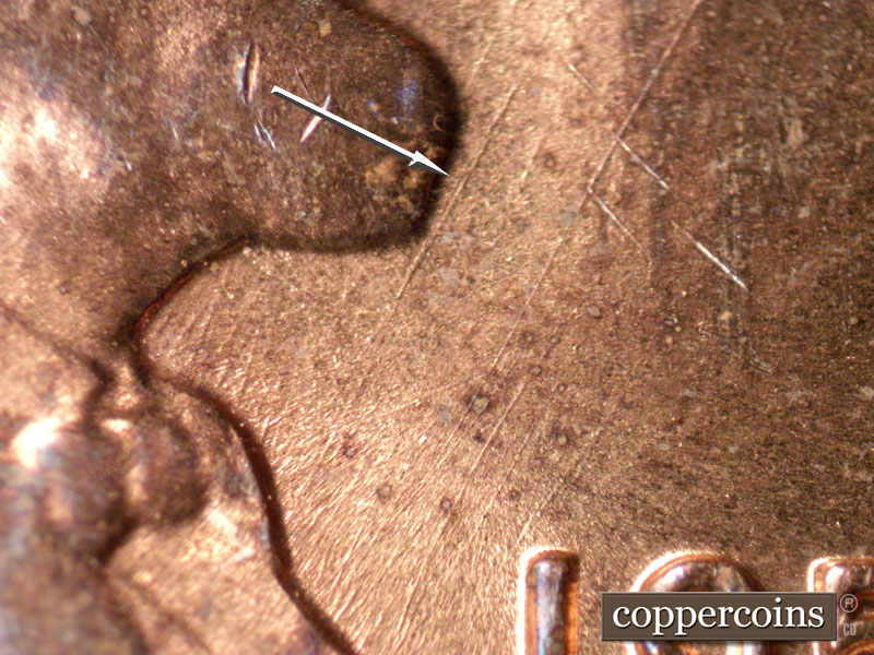 Die-stage B marker on 1958D•1MM•014 (1958 Repunched Mint Mark).