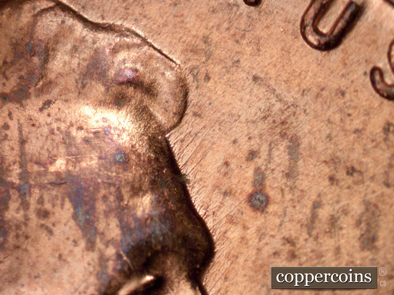Die-stage B marker on 1958D•1MM•014 (1958 Repunched Mint Mark).