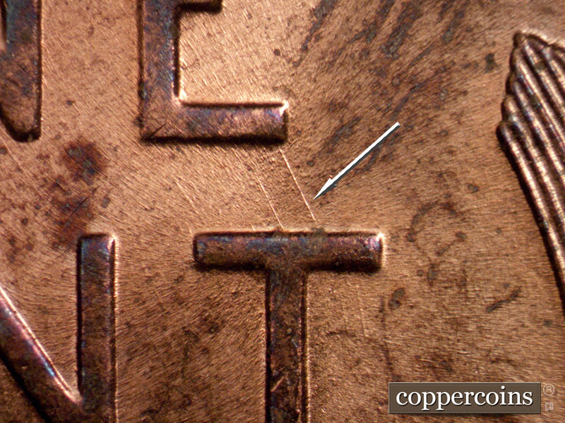 Die-stage B marker on 1958D•1MM•014 (1958 Repunched Mint Mark).