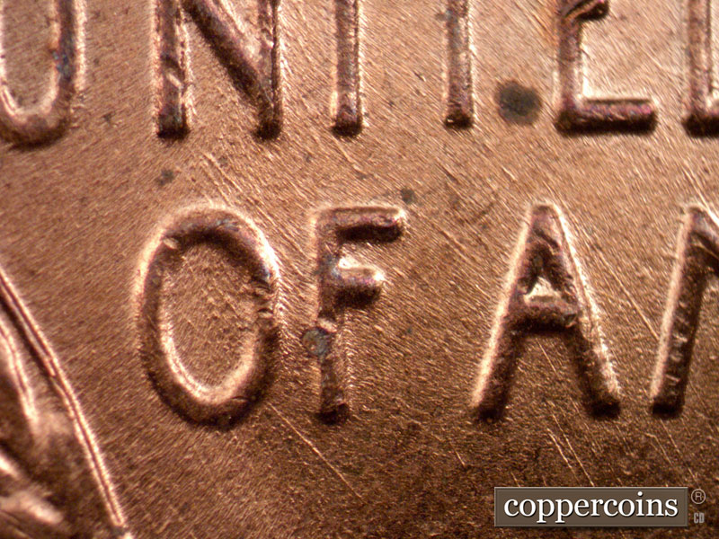 Die-stage B marker on 1958D•1MM•014 (1958 Repunched Mint Mark).