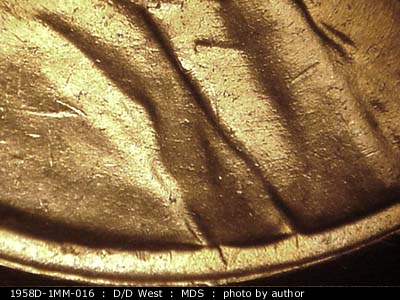 Die-stage B marker on 1958D•1MM•016 (1958 Repunched Mint Mark).
