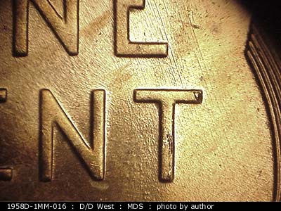 Die-stage B marker on 1958D•1MM•016 (1958 Repunched Mint Mark).