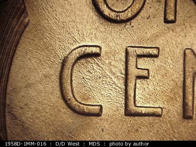 Die-stage B marker on 1958D•1MM•016 (1958 Repunched Mint Mark).