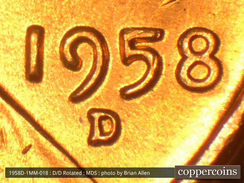 Die-stage B marker on 1958D•1MM•018 (1958 Repunched Mint Mark).