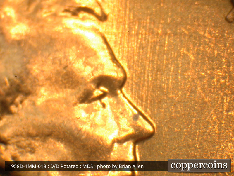 Die-stage B marker on 1958D•1MM•018 (1958 Repunched Mint Mark).