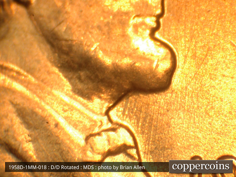 Die-stage B marker on 1958D•1MM•018 (1958 Repunched Mint Mark).
