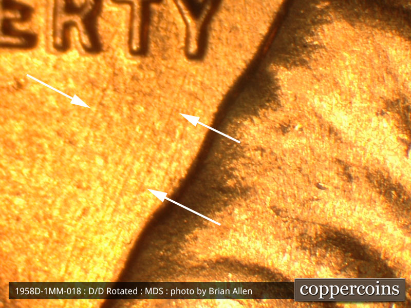 Die-stage B marker on 1958D•1MM•018 (1958 Repunched Mint Mark).
