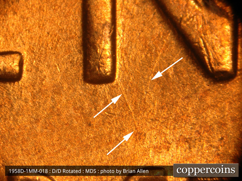 Die-stage B marker on 1958D•1MM•018 (1958 Repunched Mint Mark).