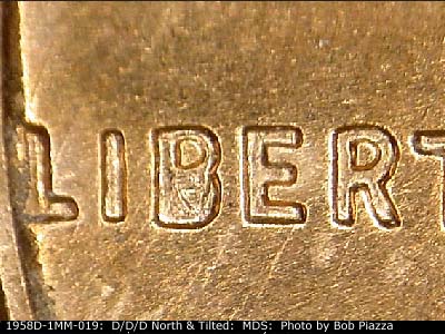 Die-stage B marker on 1958D•1MM•019 (1958 Repunched Mint Mark).