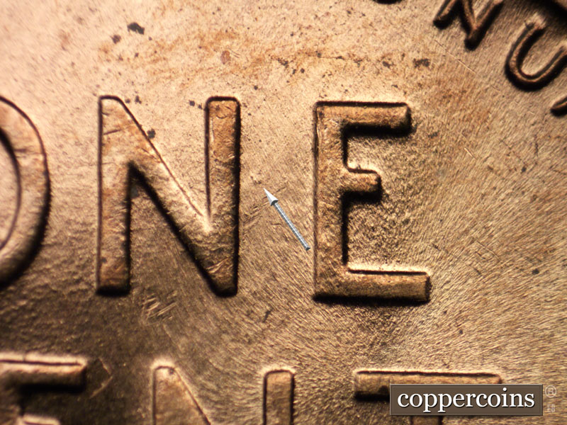 Die-stage B marker on 1958D•1MM•020 (1958 Repunched Mint Mark).