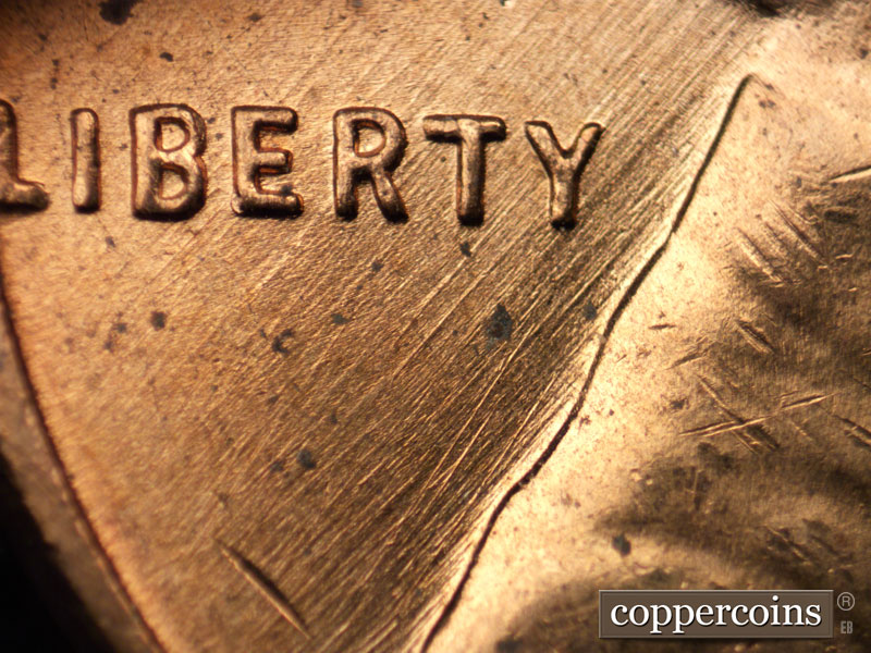 Die-stage B marker on 1958D•1MM•023 (1958 Repunched Mint Mark).