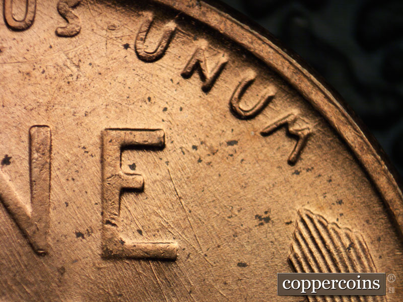 Die-stage B marker on 1958D•1MM•023 (1958 Repunched Mint Mark).