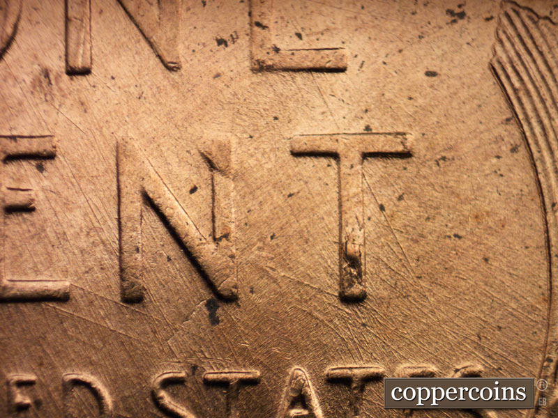 Die-stage B marker on 1958D•1MM•023 (1958 Repunched Mint Mark).