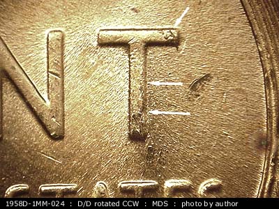 Die-stage B marker on 1958D•1MM•024 (1958 Repunched Mint Mark).