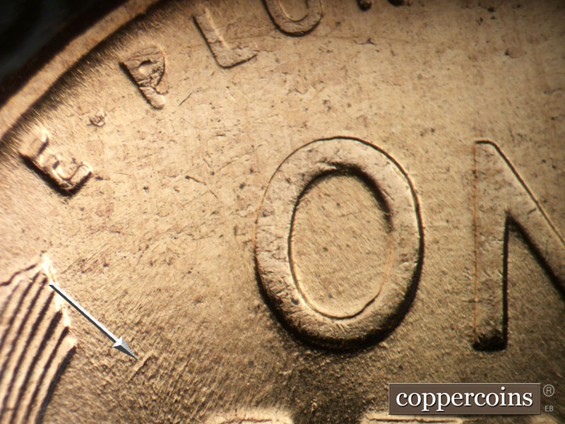 Die-stage B marker on 1958D•1MM•026 (1958 Repunched Mint Mark).