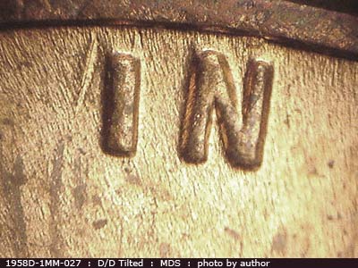 Die-stage B marker on 1958D•1MM•027 (1958 Repunched Mint Mark).