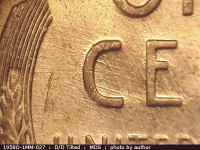 Die-stage B marker on 1958D•1MM•027 (1958 Repunched Mint Mark).