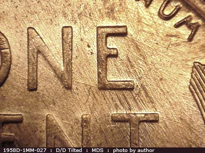 Die-stage B marker on 1958D•1MM•027 (1958 Repunched Mint Mark).
