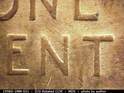 Die-stage B marker on 1958D•1MM•031 (1958 Repunched Mint Mark).