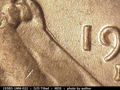 Die-stage B marker on 1958D•1MM•032 (1958 Repunched Mint Mark).