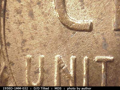 Die-stage B marker on 1958D•1MM•032 (1958 Repunched Mint Mark).