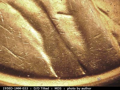 Die-stage B marker on 1958D•1MM•033 (1958 Repunched Mint Mark).