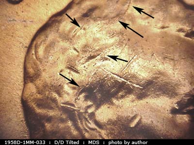 Die-stage B marker on 1958D•1MM•033 (1958 Repunched Mint Mark).