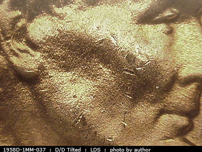 Die-stage C marker on 1958D•1MM•037 (1958 Repunched Mint Mark).