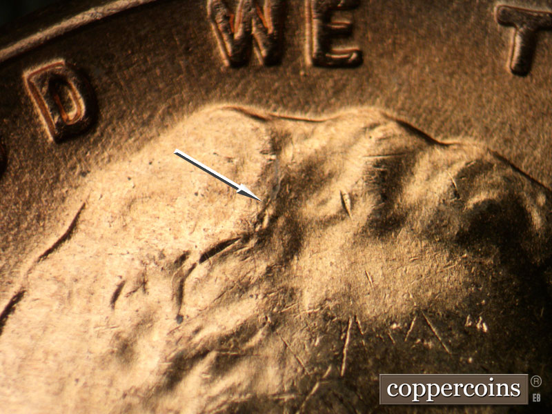 Die-stage B marker on 1958D•1MM•040 (1958 Repunched Mint Mark).