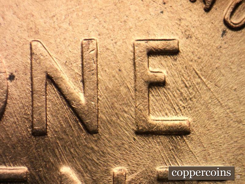 Die-stage B marker on 1958D•1MM•040 (1958 Repunched Mint Mark).
