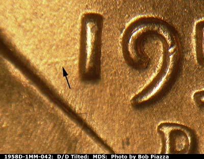 Die-stage B marker on 1958D•1MM•042 (1958 Repunched Mint Mark).