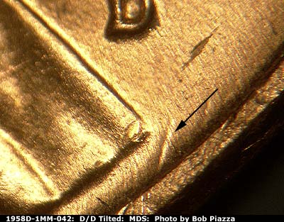 Die-stage B marker on 1958D•1MM•042 (1958 Repunched Mint Mark).