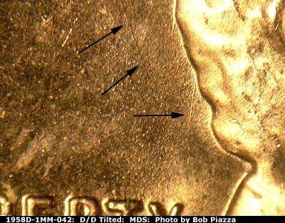 Die-stage B marker on 1958D•1MM•042 (1958 Repunched Mint Mark).