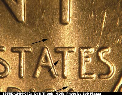 Die-stage B marker on 1958D•1MM•042 (1958 Repunched Mint Mark).
