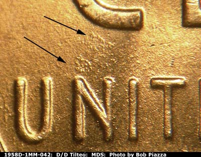 Die-stage B marker on 1958D•1MM•042 (1958 Repunched Mint Mark).