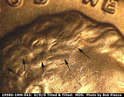 Die-stage B marker on 1958D•1MM•043 (1958 Repunched Mint Mark).