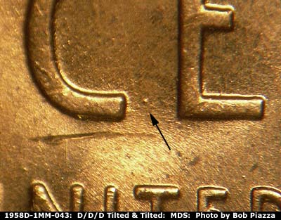 Die-stage B marker on 1958D•1MM•043 (1958 Repunched Mint Mark).