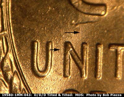 Die-stage B marker on 1958D•1MM•043 (1958 Repunched Mint Mark).