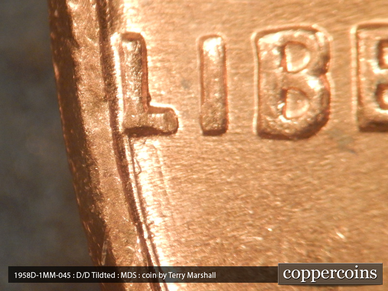 Die-stage B marker on 1958D•1MM•045 (1958 Repunched Mint Mark).