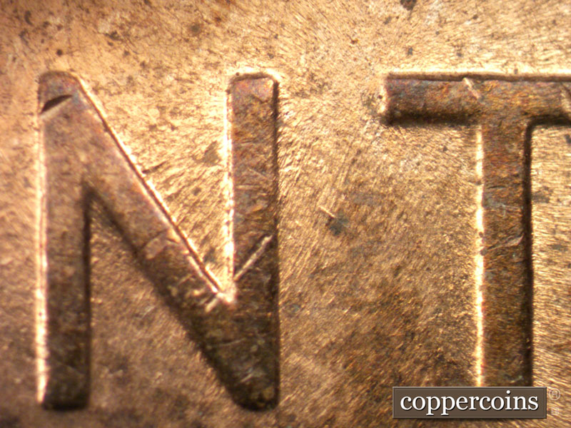 Die-stage B marker on 1958D•1MM•046 (1958 Repunched Mint Mark).